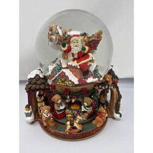 See Video KIRKLAND MUSICAL WATER‎ GLOBE W/REVOLVING MUSICAL BASE SNOWGLOBE